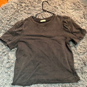 Dark gray thick T Shirt.